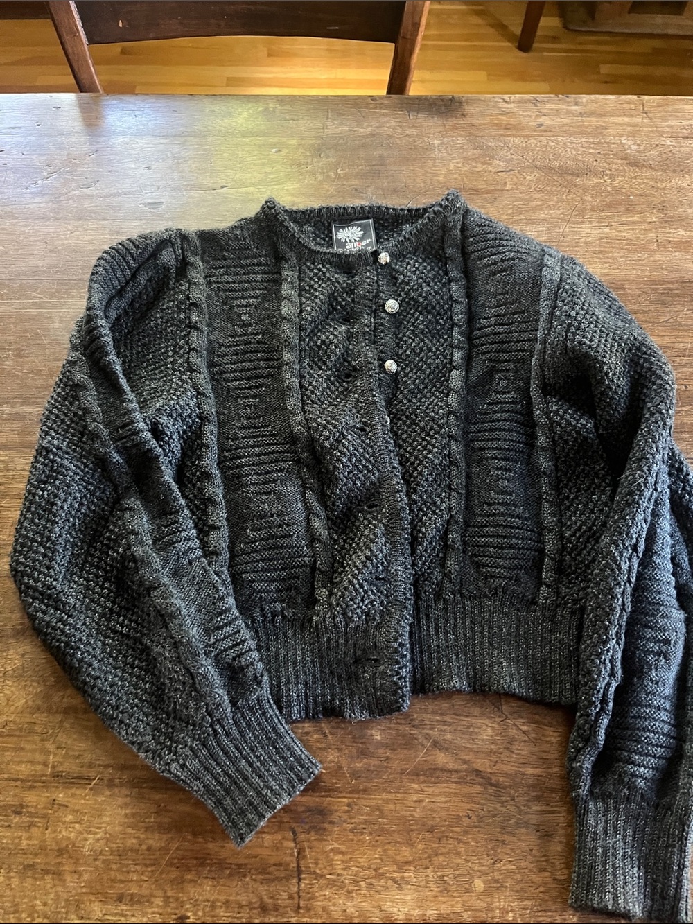 Vintage German Charcoal Cable Knit Cardigan Sweater with silver buttons.